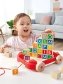 Игрушечная детская деревянная каталка-тележка Hape с кубиками и английским алфавитом (26 кубиков в наборе) E0487_HP