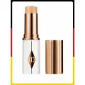 Тональная основа Charlotte Tilbury Unreal Skin Sheer Glow Tint 6 Medium