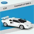 Металлическая коллекционная модель автомобиля Welly. Lamborghini Countach LP 5000-S. Ламборгини. Авто из к/ф Волк с Уолл-Стрит (Масштаб 1/24, белая)