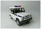 Коллекционная машинка игрушка металлическая УАЗ-469 для мальчиков масштабная модель 1:24 белый