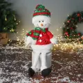 Мягкая игрушка Снеговик в полосатом колпаке с длинными ножками 48х23 см