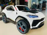 Электромобиль детский Lamborghini Urus SMT-666 белый полноприводный 4WD