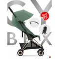 Cybex Coya Коляска c бампером и дождевиком, рама Rose Gold/текстиль Leaf Green