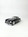 Коллекционная машинка игрушка Мерседес 300 SL с дымом ретро-модель масштаб 1:24 черный
