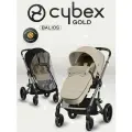 Коляска прогулочная Cybex Balios S LUX NEW Almond Beige с накидкой для ног и дождевиком