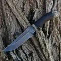 Нож Таёжный из дамасской стали с долами на клинке и литьём из мельхиора (основание тигр), рукоять граб