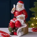 Новогодняя фигурка Санта Клаус со списком 18 см, Edelman, 1101277