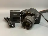 Canon 2000D Kit 18-55mm 3.5-5.6 III 2.518 кадров, царапина