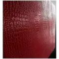 Рельефная кожа крокодила - тонкие стеновые панели из гибкого цемента 880х460х2мм. Цвет красный, глянцевый лак, интерьер.
