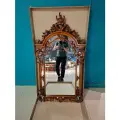 Интерьерное зеркало DOMKORLEONE в резной деревянной раме из красного дерева (mahogany wood), цвет орех NAA
