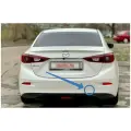 Белая правая заглушка заднего бампера Mazda 3 BM седан (2013-2018)