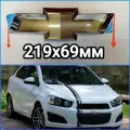 Передняя эмблема Chevrolet Aveo T300