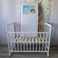Кроватка Kristi колесо качалка белый + матрас Fino Latex