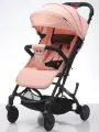 Коляска прогулочная складная для путешествий Tommy Trip коралловая