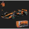 Металлическая коллекционная модель Bburago болида Макларен + фигурка гонщика Оскара Пиастри. (Oscar Piastri McLaren, MCL38 №81) Сезон 2024 г. Формула-1. Масштаб 1:24