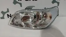 Фара передняя левая Chevrolet Aveo T255 (хэтч) 06-12 (мех)
