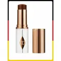 Тональная основа Charlotte Tilbury Unreal Skin Sheer Glow Tint 16 Deep