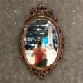 Интерьерное зеркало E089-HP от DOMKORLEONE в резной раме из красного дерева (mahogany wood), цвет орех HP (коричневый)