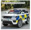 Детский электромобиль, четырехколесную полицейскую машину, можно использовать в качестве ремня качания