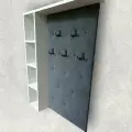 Настенная мягкая панель в прихожую - коридор, с полкой белого ЛДСП и серого микровелюра в каретной стяжке, с местом для хранения.