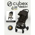 Коляска Cybex Beezy Chocolate Brown 2026 с бампером и дождевиком