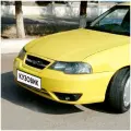 Бампер передний в цвет кузова для Дэу Нексия Н150 Daewoo Nexia N150 (2008-2016) 54K - YELLOW - Желтый