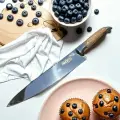 NIHONTO Японский кухонный Шеф-нож. Профессиональный шеф - нож с двусторонней симметричной заточкой. Сталь AUS-8. Длина лезвия 20 см. Дизайнерская рукоять из оливкового дерева