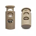 Фиксатор для шнура 'Цилиндр' 27005-СС, 9*22 мм, 2 отверстия диаметр 4 мм, пластик (бежевый), 100 шт